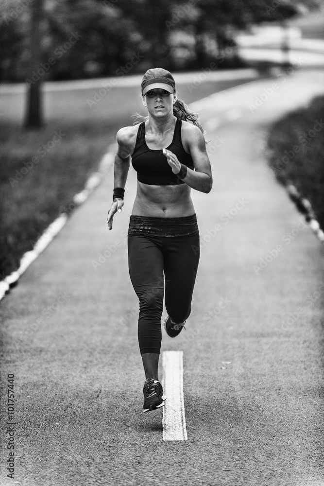 Obraz na płótnie Woman jogging in black and