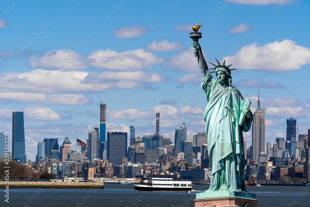 Fototapeta The Statue of Liberty over the