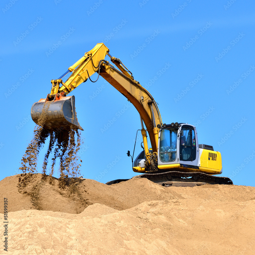 Fototapeta new yellow excavator working